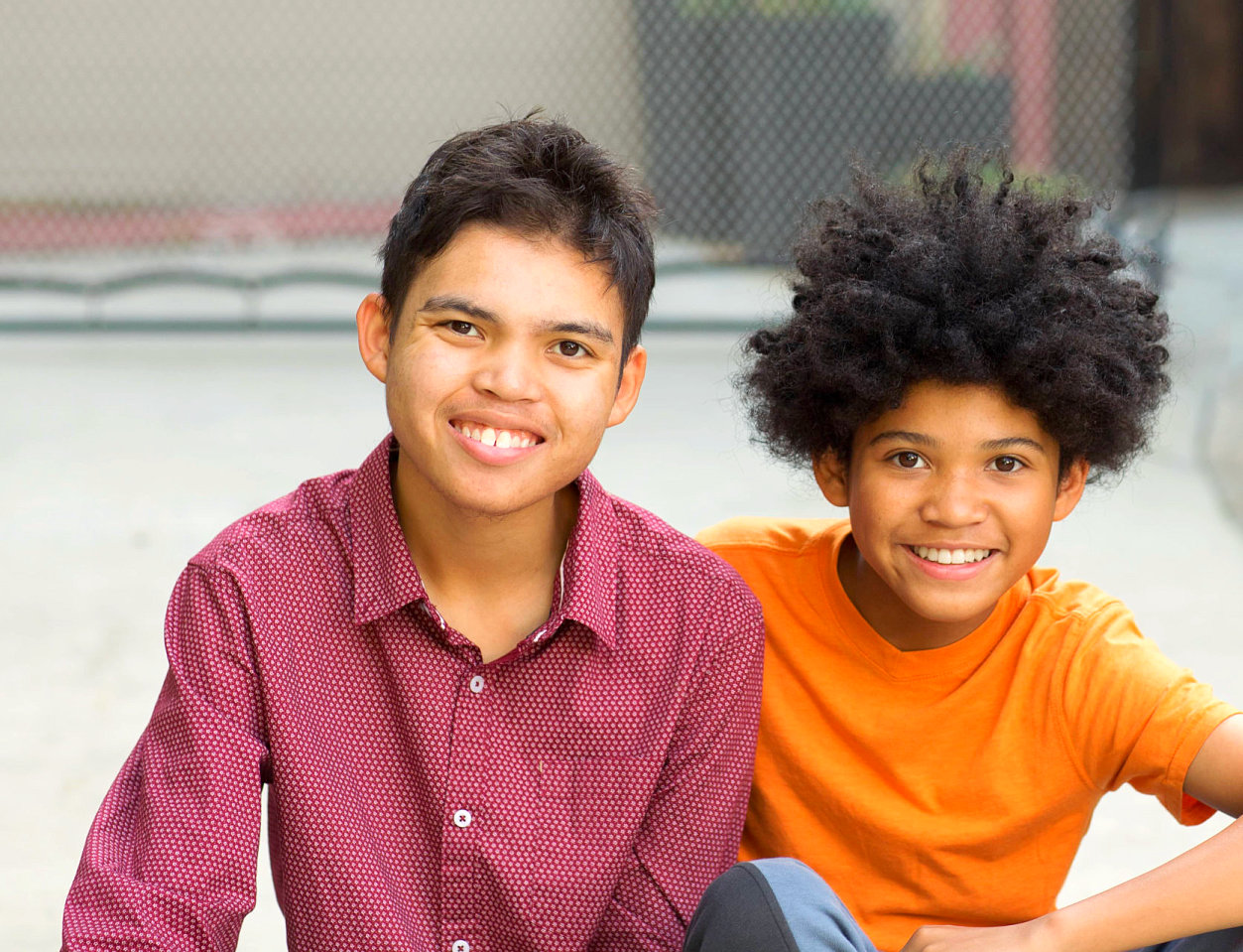 two male kids smiling